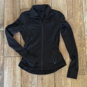 Lululemon Black Jacket with Fitted Design and High Collar
